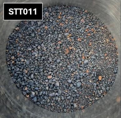 STT011 concentrate photograph reproduced from the supplied TML report